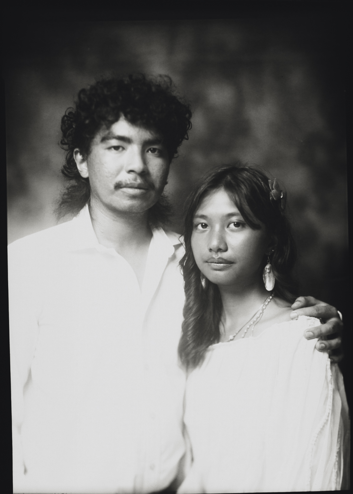 Black and white 5×7 large format portrait of a couple dressed in white, made on an original 1950s large format camera